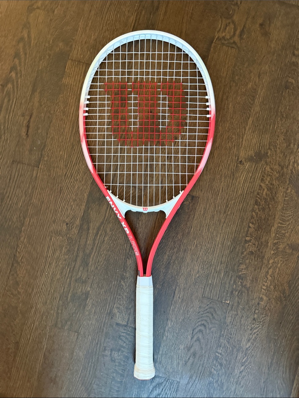 Wilson White and Pink Tennis Racket - Lightweight Court Performance